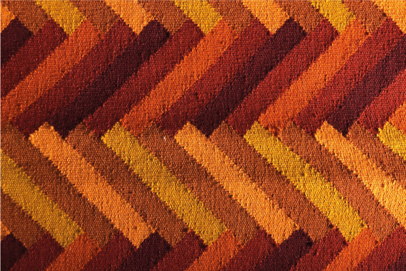 Podmetač tekstura s vibrantnim geometrijskim uzorkom - TenStickers